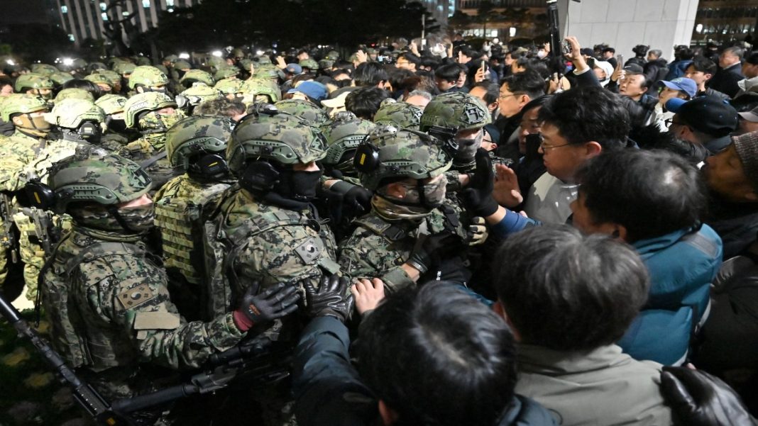 South Korean lawmakers block President Yoon’s martial law decree as thousands protest